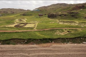 Photograph of the Norse ruins and the modern settlement of Qassiarsuk
