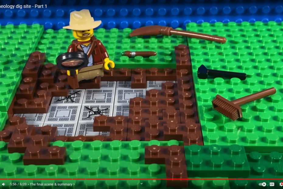 Video screenshot, showing an archaeological dig made of LEGO