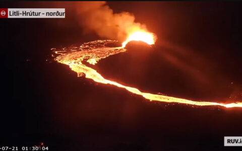 Screenshot from a video of the Volcanic Eruption at Litli-Hrútur, Iceland in 2023, showing lava glowing in the dark
